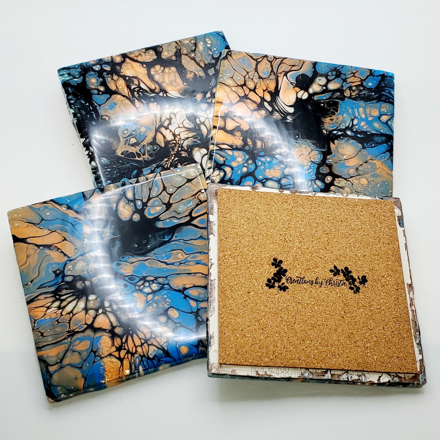 BLACK AND BLUE COASTERS